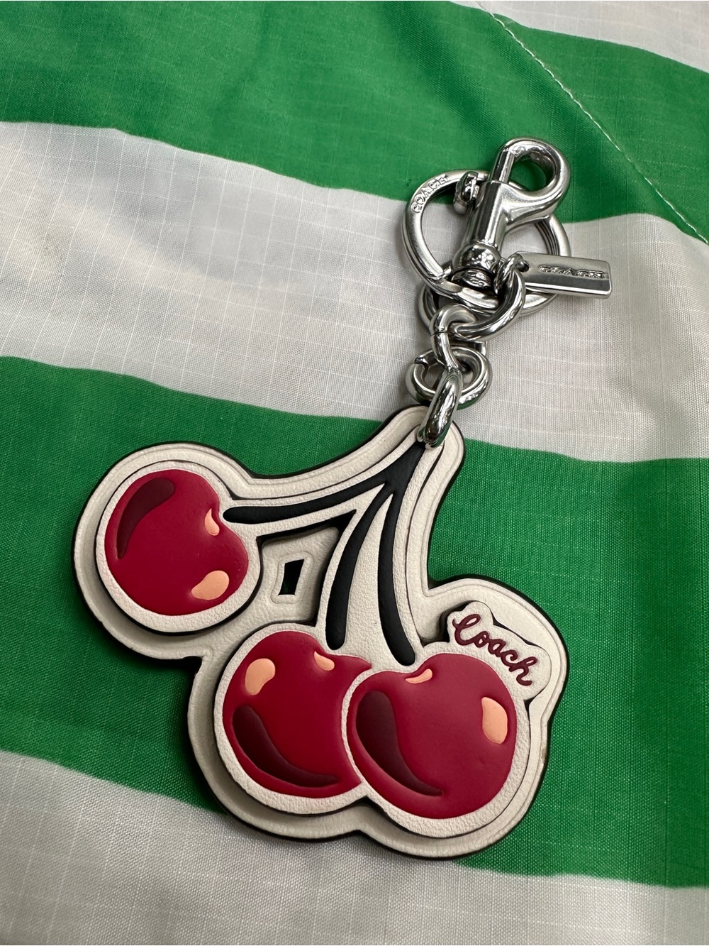 COACH cherry leather bag charm